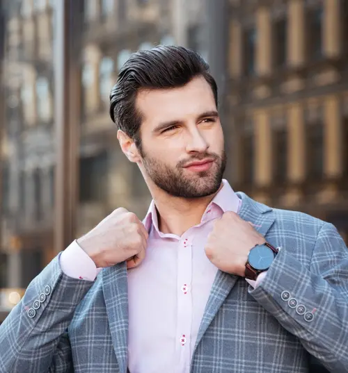 Architect working on design plans with natural materials